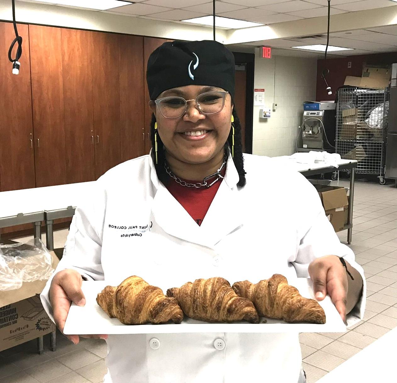 culinary student with croissants